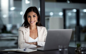 Confident paralegal at computer in office